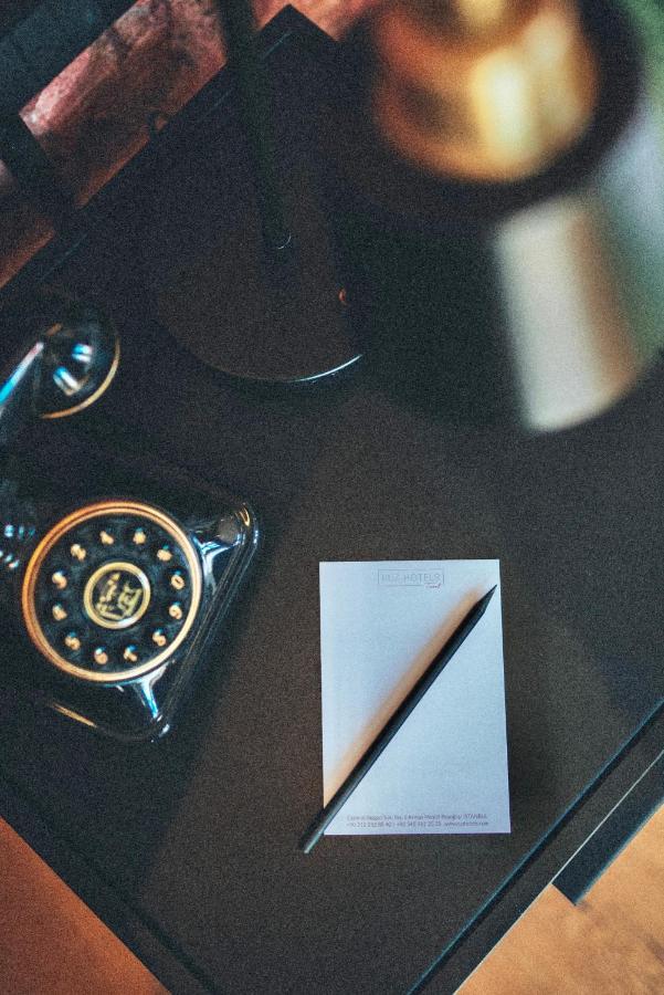 Ruz Hotels Istanbul Luaran gambar A telephone with a built-in memo pad